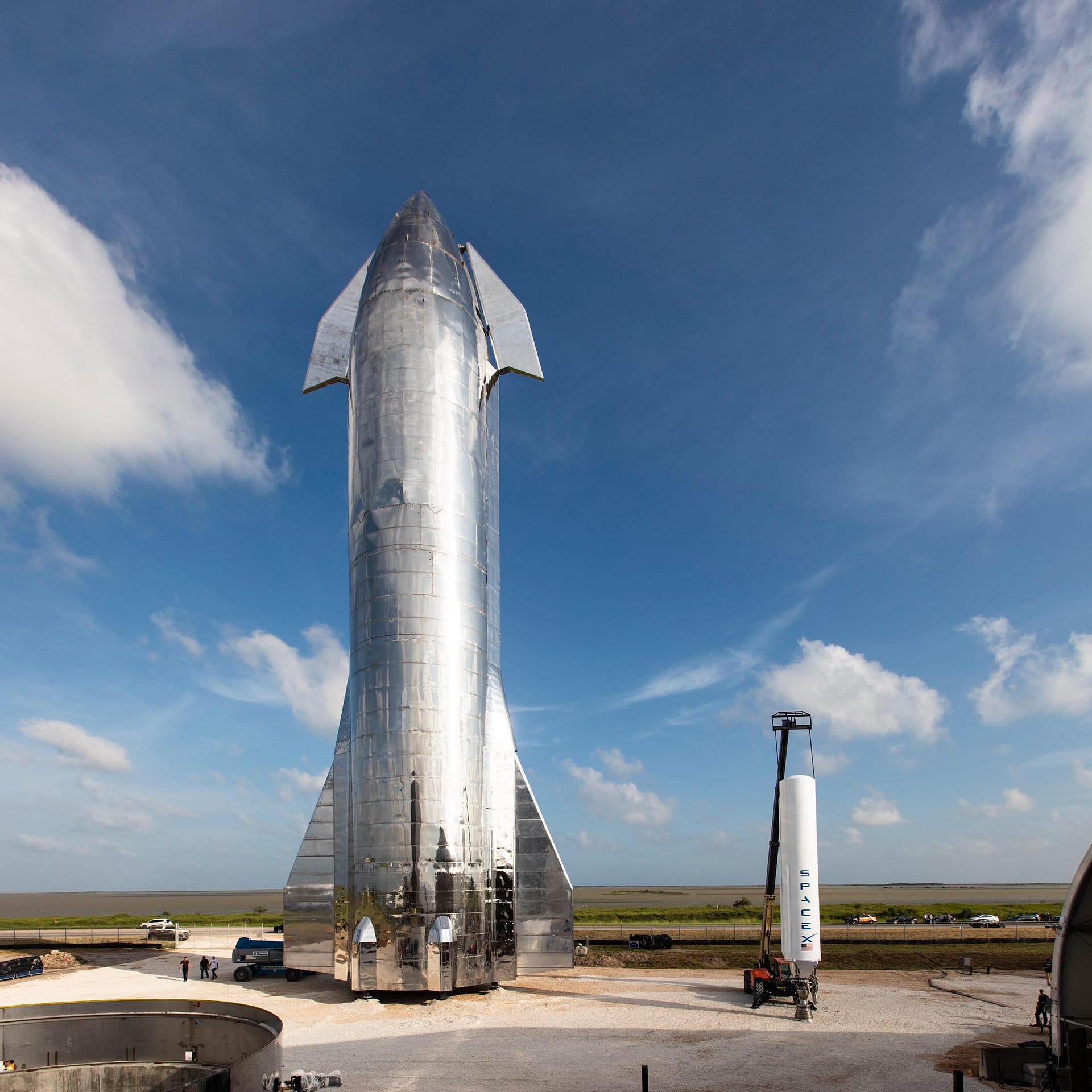 Modern aesthetic visual of SpaceX Starship flights, showcasing the launch of Starship 8 and 9 with a cosmic background.